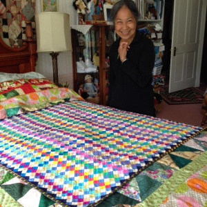 Niyama with her quilt